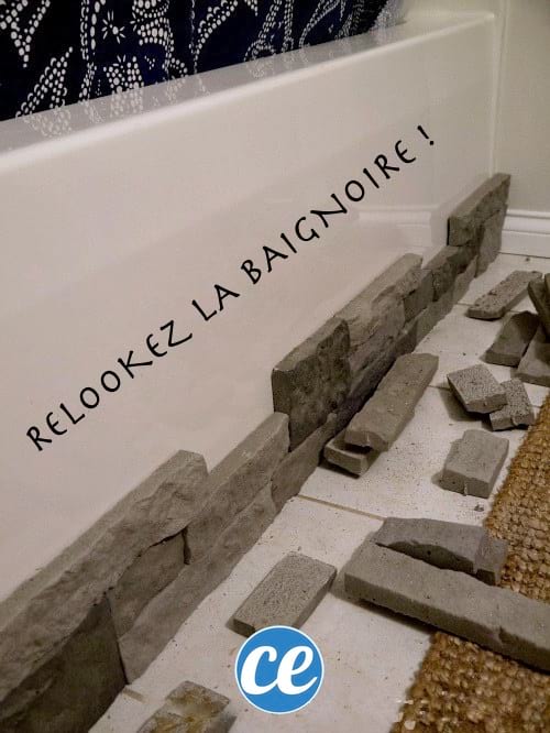una bañera renovada con piedras
