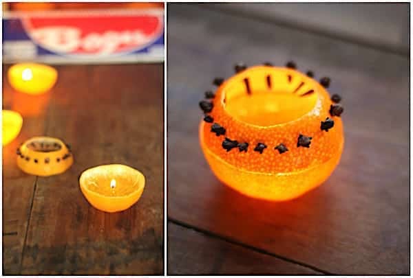 una vela repelente de mosquitos de bricolaje hecha con clavo y una naranja