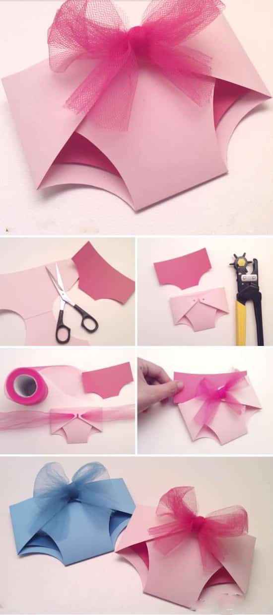 bragas de papel doblado rosa o azul para dar anuncios de nacimiento