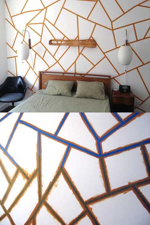 Flere oransje rektangler malt på en vegg