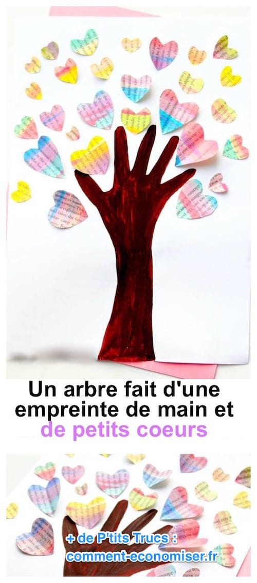 un árbol pintado con una huella de mano y corazones