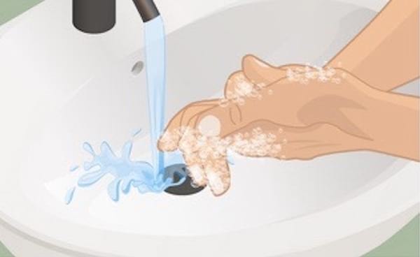 איור של שטיפת ידיים תחת מי ברז זורמים.