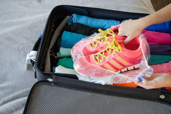 put your dirty shoes in a swimming cap and then in your suitcase