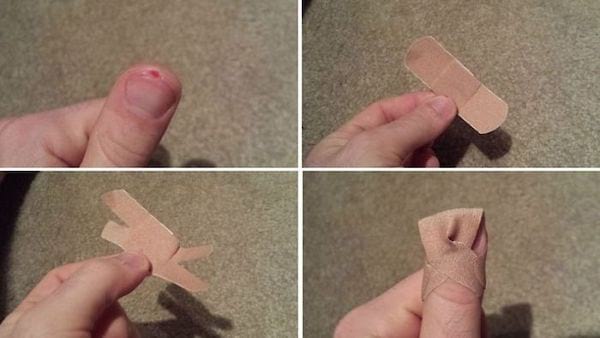 El método para que un vendaje en un dedo no se deslice.
