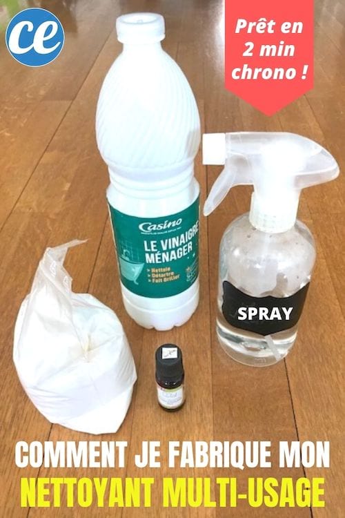 Un spray limpiador multiusos con una botella de vinagre blanco, bicarbonato de sodio y aceite esencial.