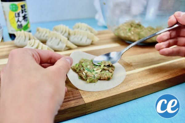How to spread the stuffing on a gyoza leaf.