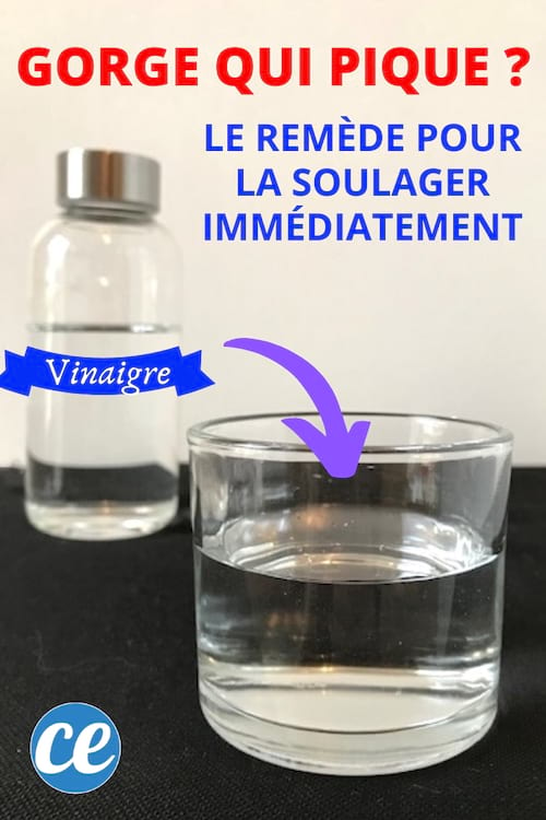 Un vaso de agua con vinagre con una botella de vinagre blanco para aliviar el dolor de garganta.